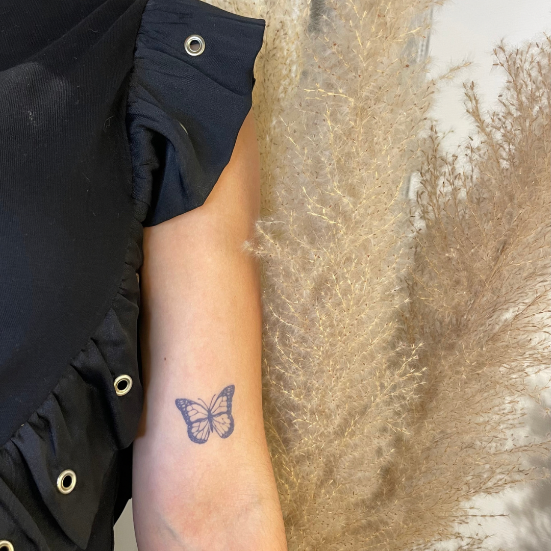 Tillfällig tatueringsfjäril