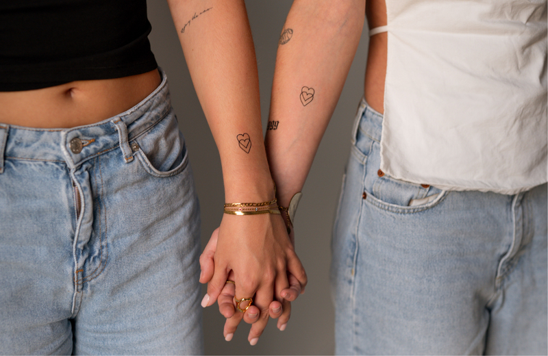 Mor dotter tatueringar