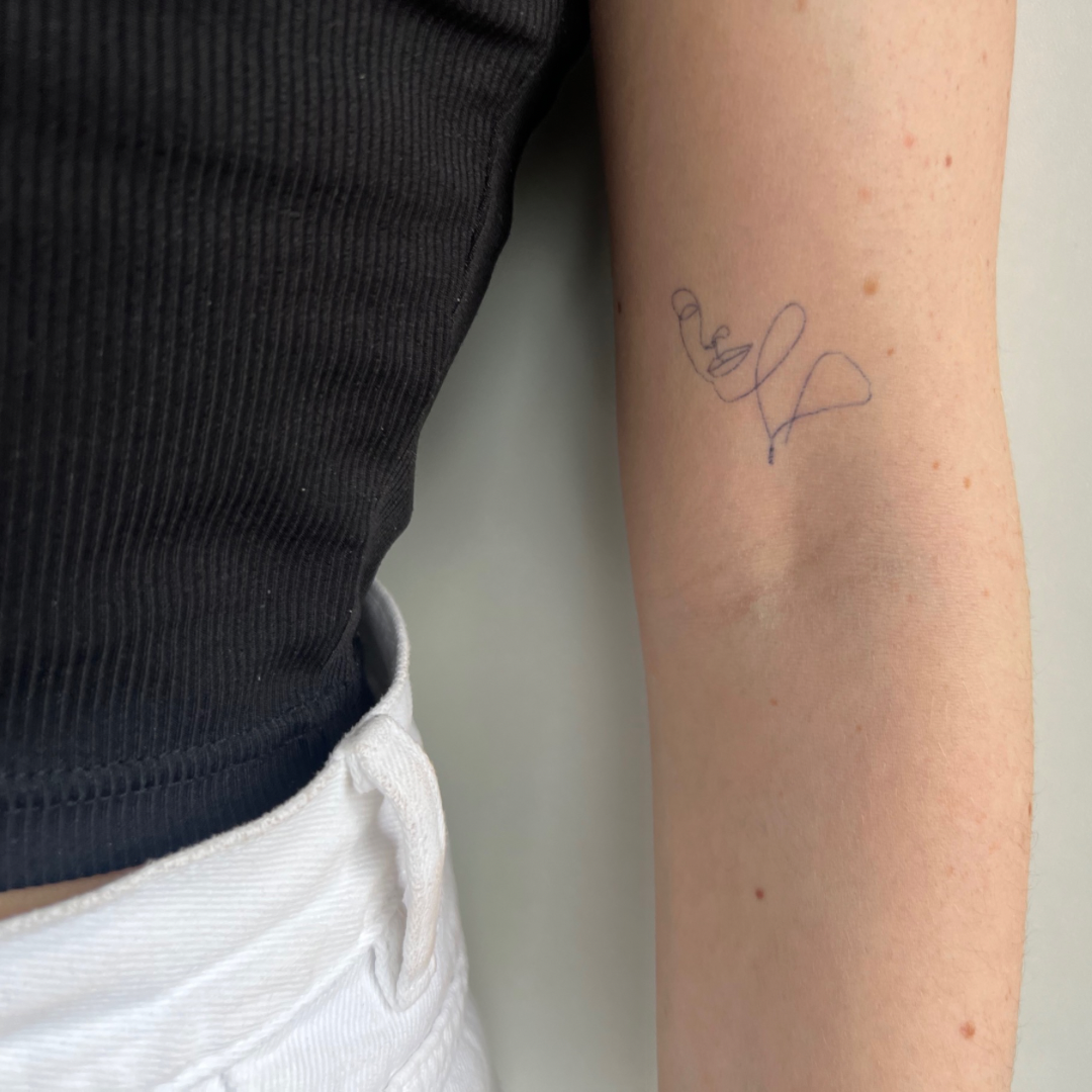 Tillfällig tatuering ansikte finlinje