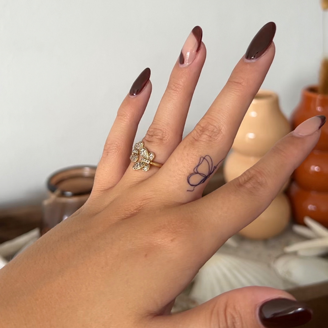 Tillfällig tatuering fjäril finlinje